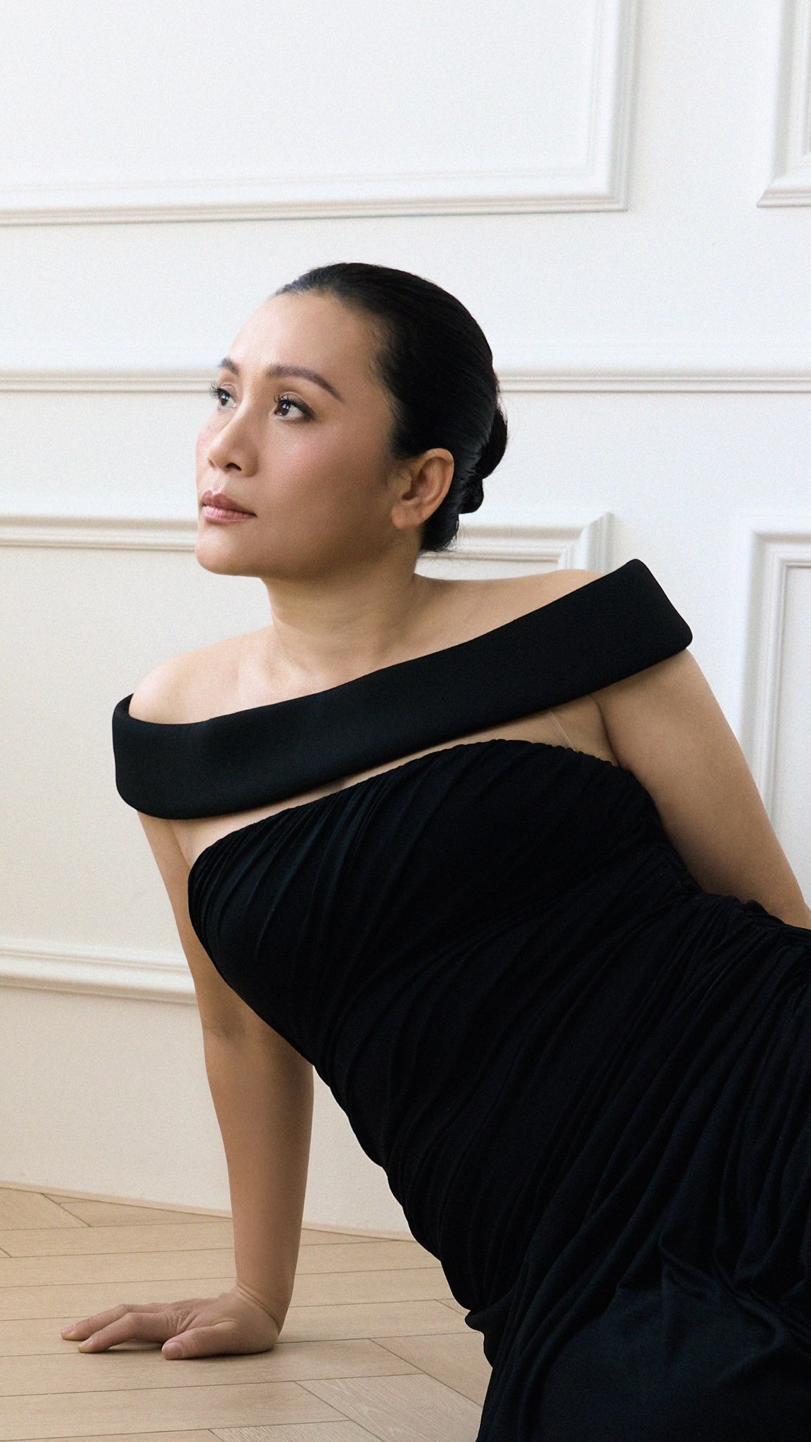 Hong Tuyen Nguyen in a black gown